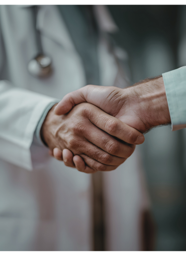Patient and Doctor shaking hands Patient and Doctor shake hands after establishing trust